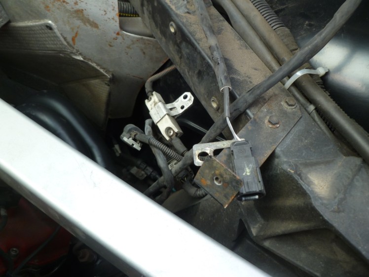 One bolt is hidden under the frame